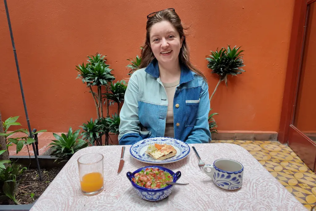 Chelsea having breakfast in Mexico City at the Red Tree House CDMX