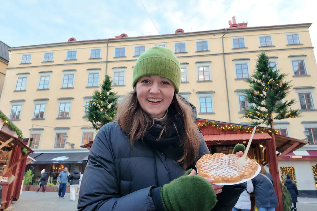 Chelsea with waffle at Stortorgets Julmarknad Gamla Stan