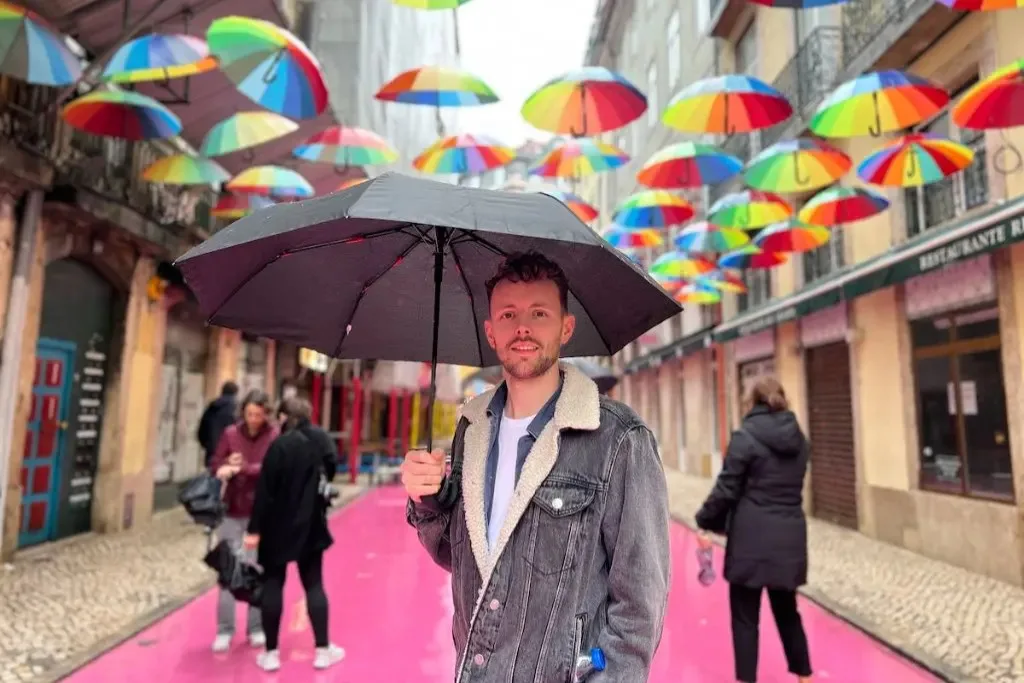 James with umbrella in Lisbon