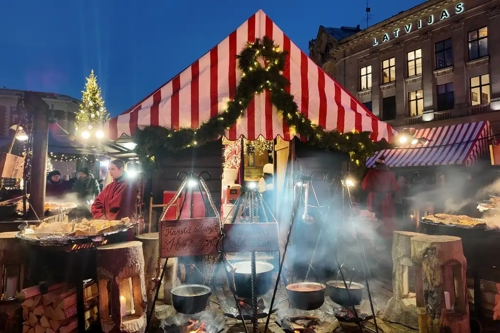 Food cooking on an open fire at Riga Christmas Market