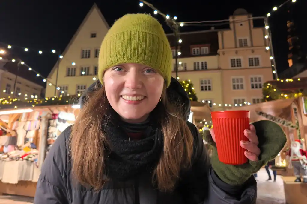 Chelsea with a mulled wine at Tallinn Christmas Market