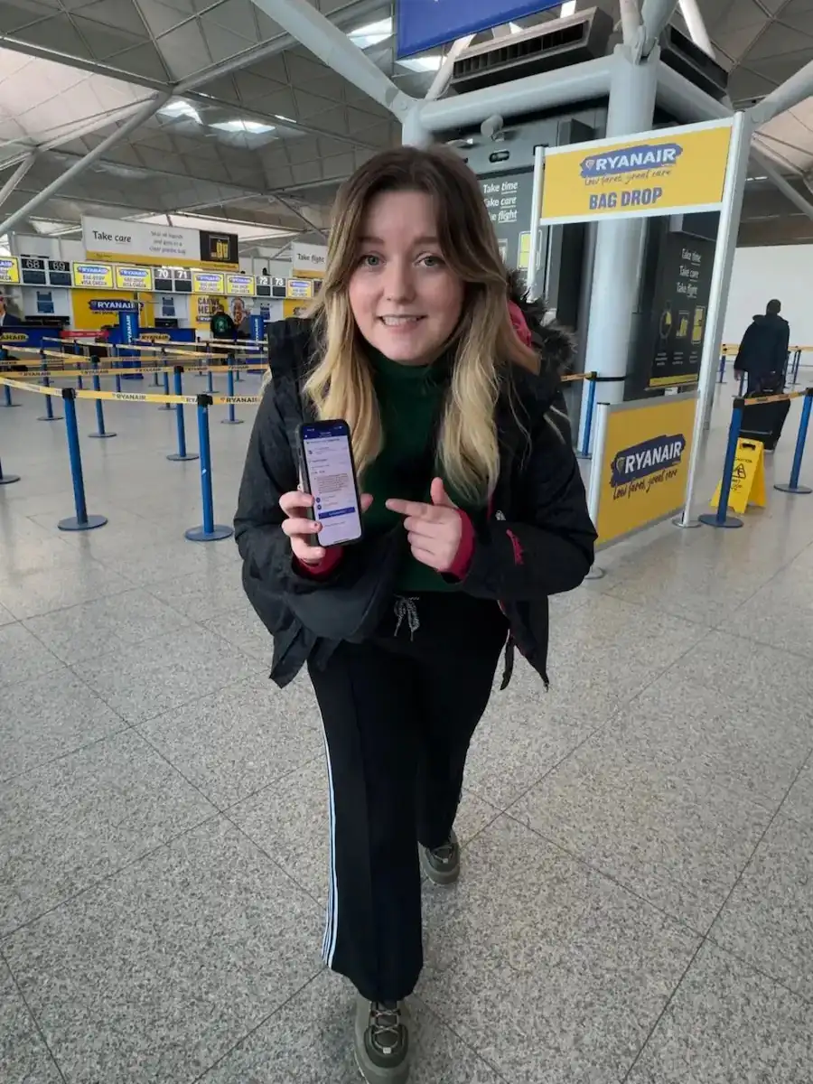 chelsea at the airport with a ryanair boarding pass