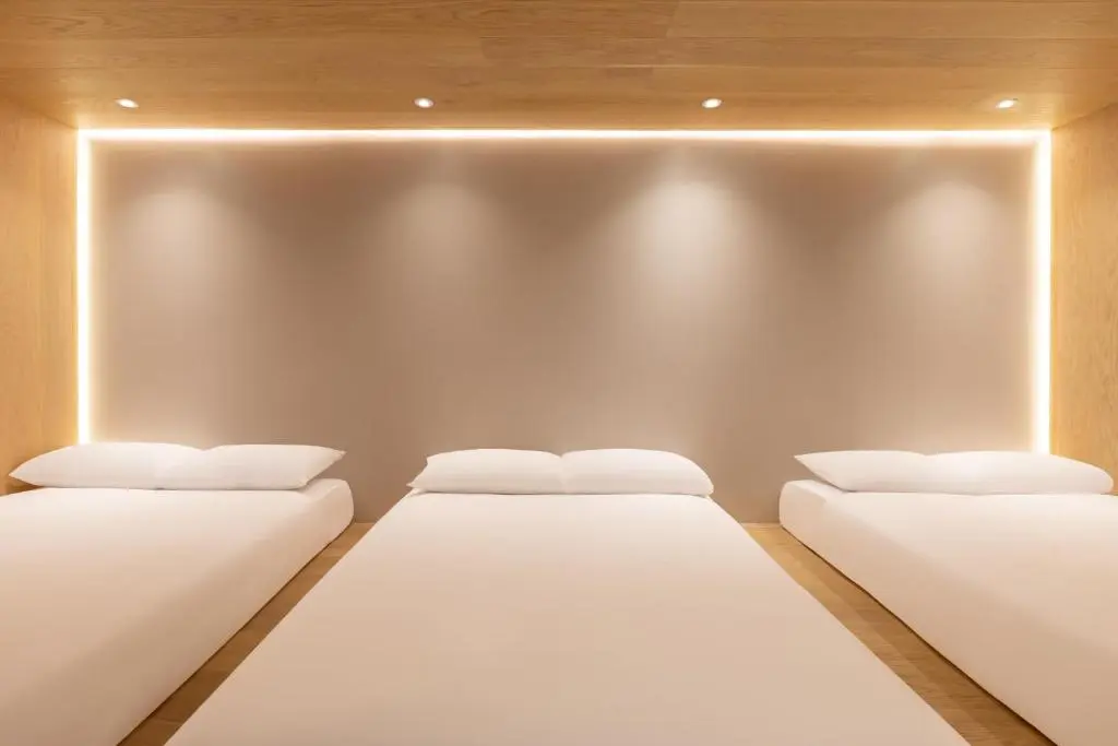 Cocoon room with 3 double beds at Zedwell Piccadilly Circus