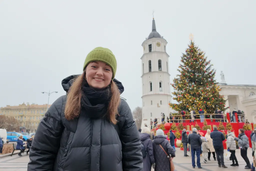 Chelsea by the tree at Vilnius Christmas Market