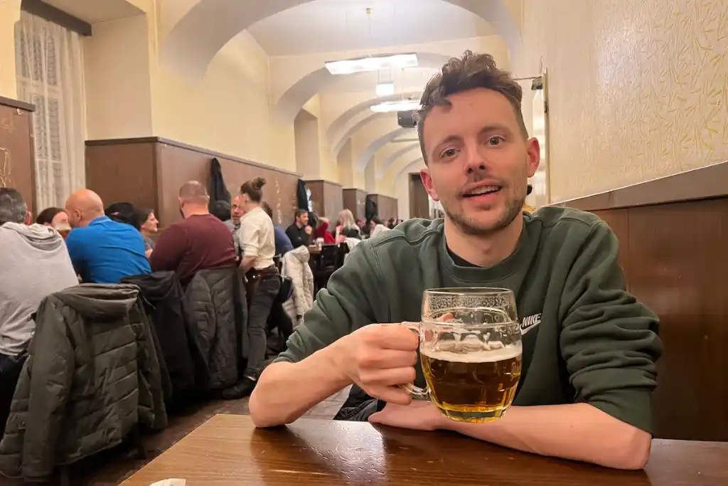 James with a beer in Prague