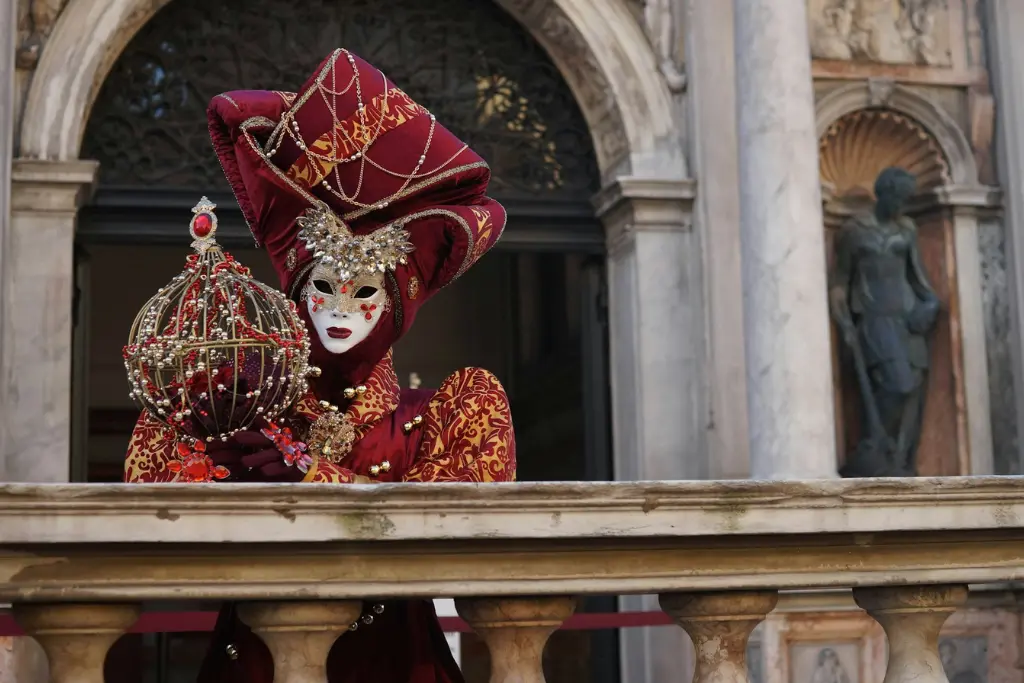 A masked figure at Venice carnival