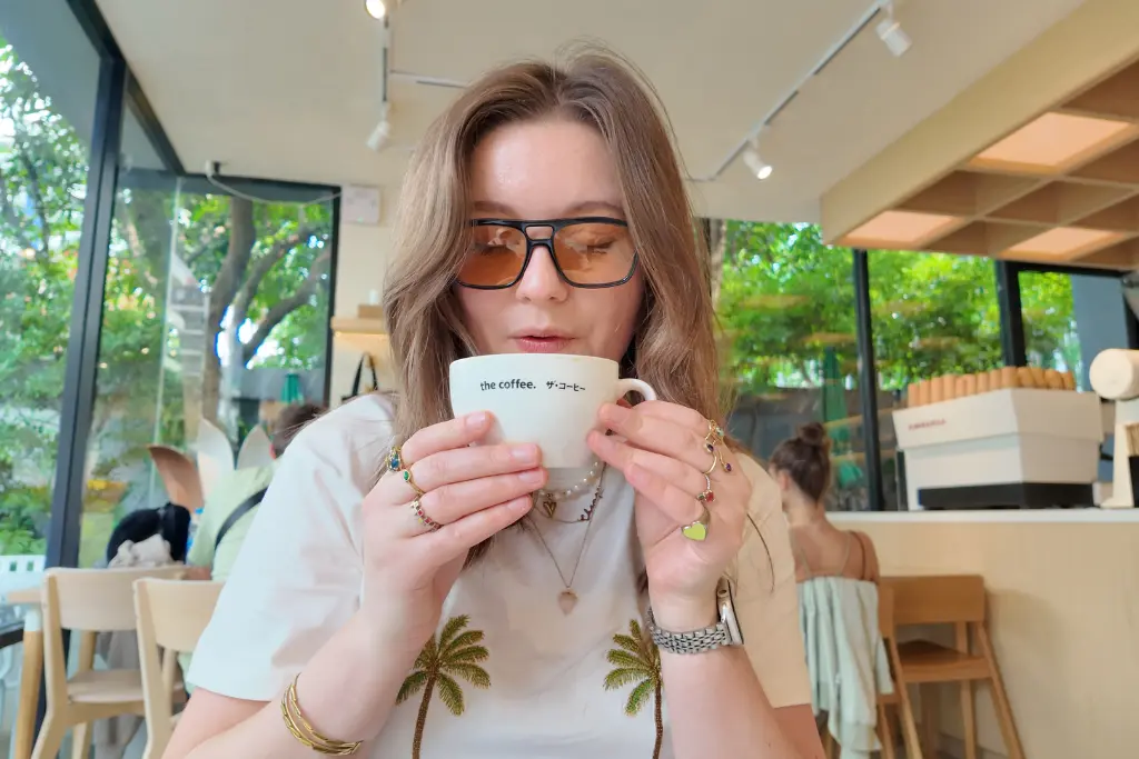 Chelsea with a coffee in Bangkok