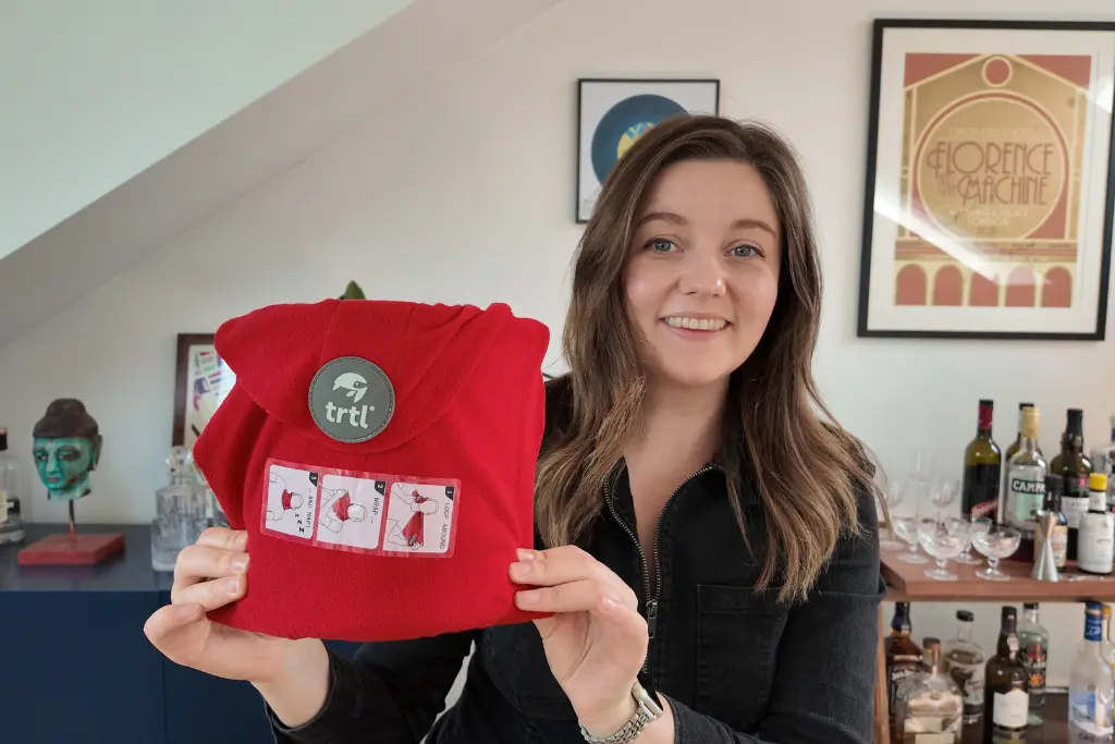 Chelsea with trtl travel neck pillow best travel gifts