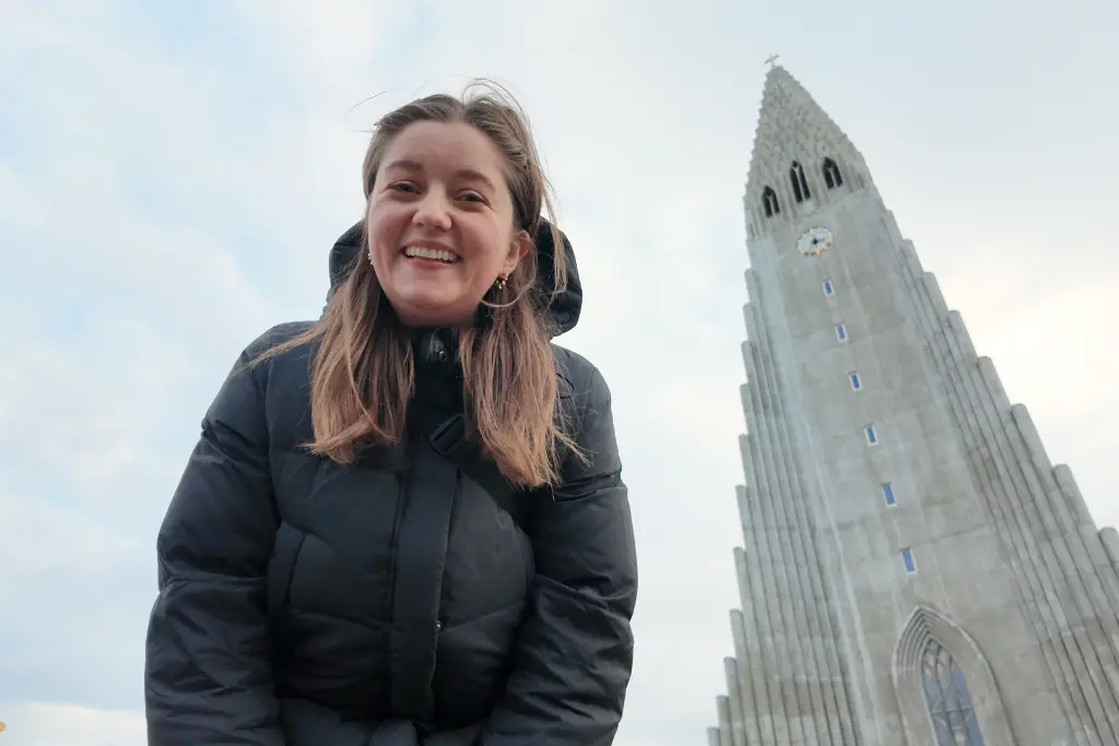Chelsea with Hallgrimskirkja church on free walking tour of Reykjavik