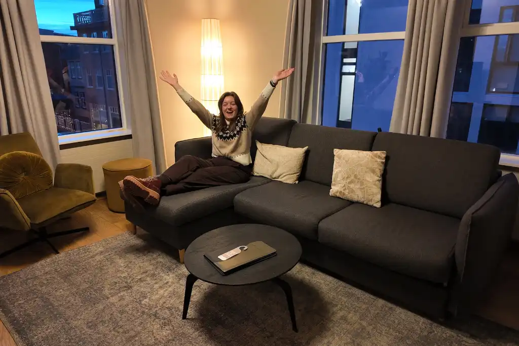 Chelsea on the sofa in the room at Hotel Fron Reykjavik Iceland