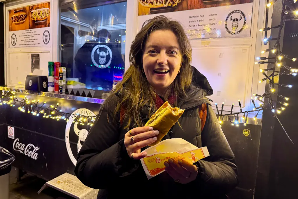 chelsea with hotdog at Víkinga Pylsur Reykjavik Iceland