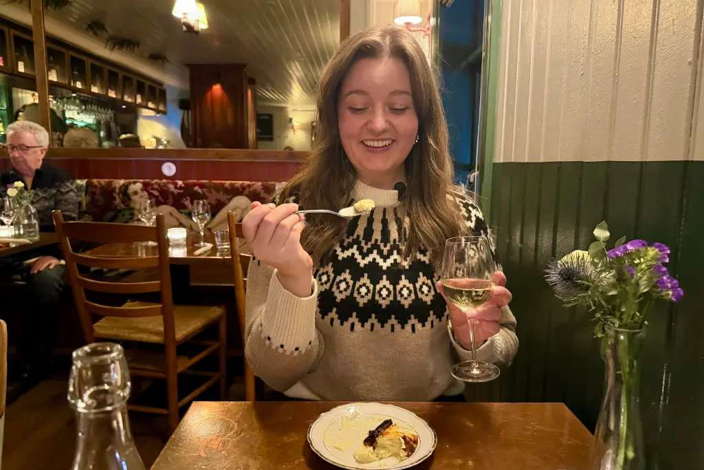 Chelsea with basque cheesecake at Skreið Reykjavik Iceland