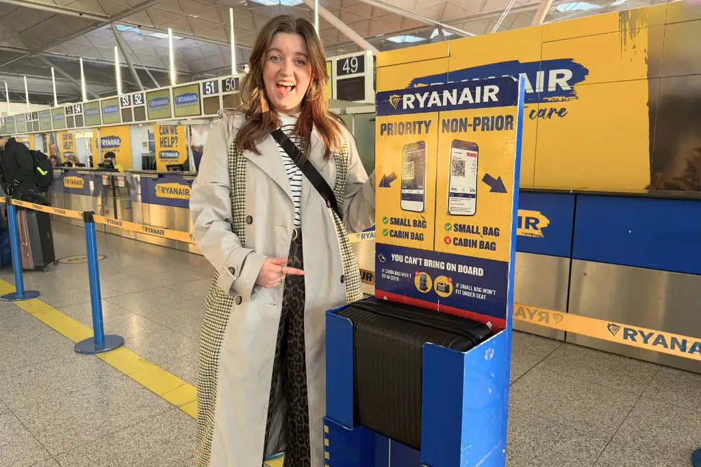 Chelsea with the Primark suitcase in the Ryanair baggae sizer