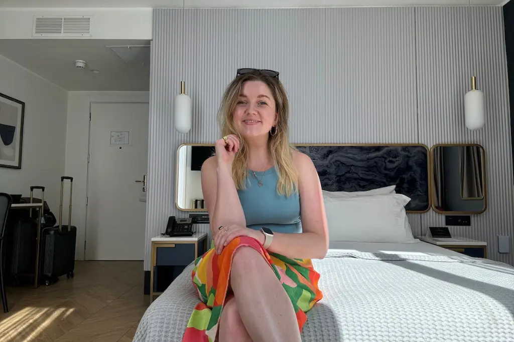 Chelsea in a hotel room on holiday