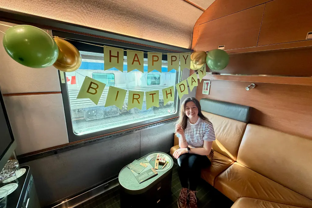 Chelsea celebrating her birthday in the Prestige cabin on The Canadian