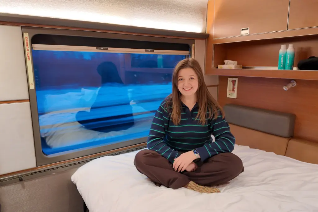 Chelsea on the bed in Prestige class on The Canadian