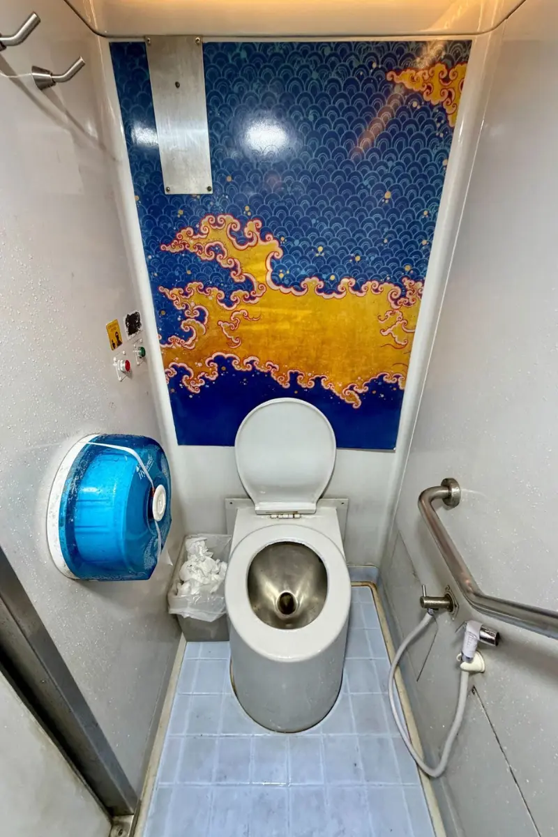 Western-style toilet in first class on the bangkok to surat thani train