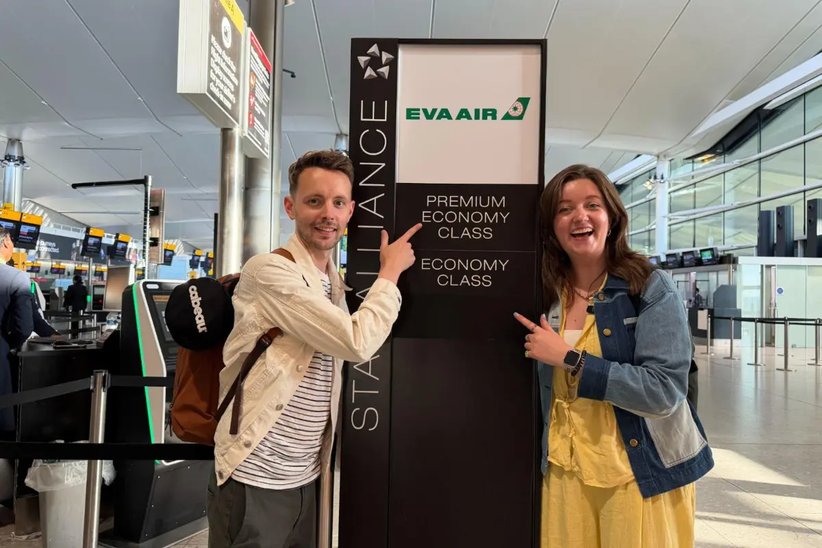 James and Chelsea with EVA gate sign